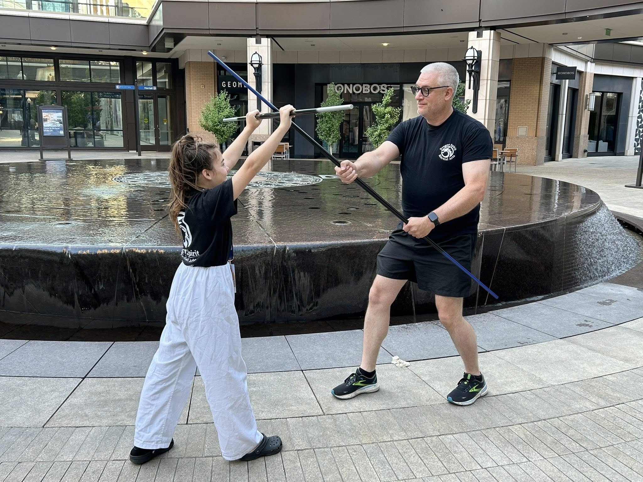Amelia Werner and Master Thomas Werner practicing weapons